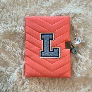 New Diary letter L with lock and keys from Claire’s. Orange